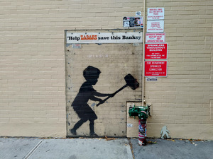 Boy with Hammer – Banksy Street Art