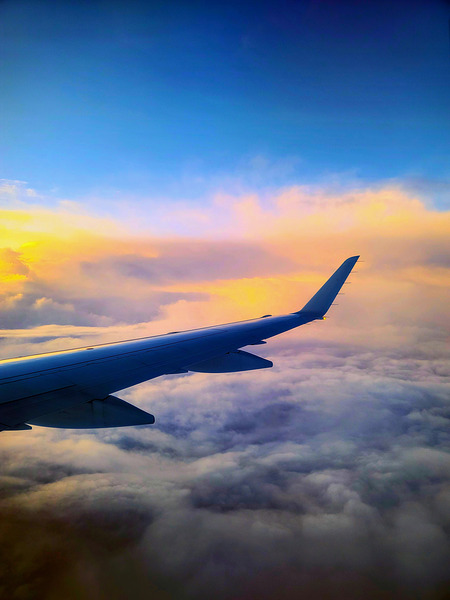 Above the Clouds: Flying into the Sunrise Digital Download