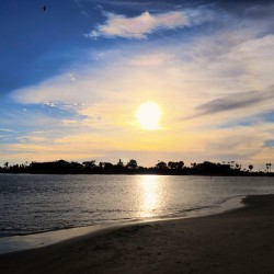 Soft Waves Carry the Day’s Goodbye